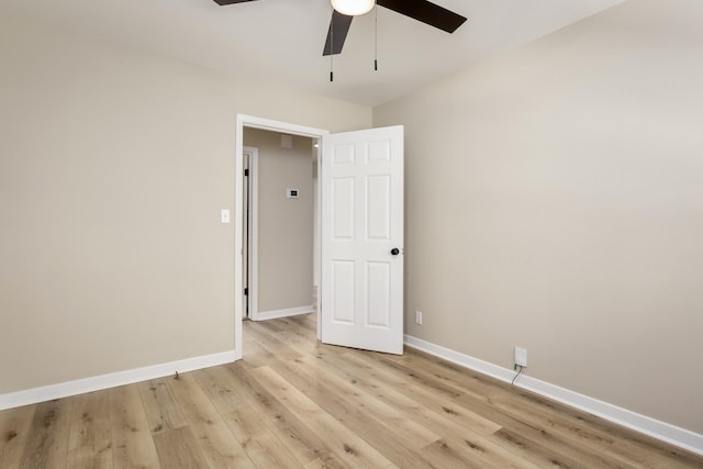 unfurnished room with ceiling fan and light hardwood / wood-style flooring