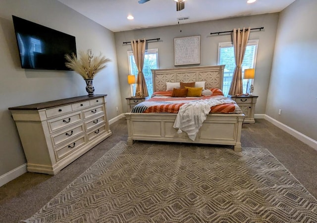  - bedroom with dark colored carpet, multiple windows, recessed lighting, and ceiling fan