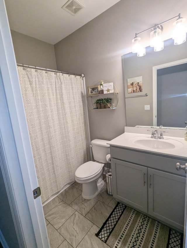  - full bath with vanity, marble finish floors, and a shower with shower curtain
