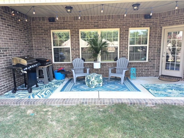  - view of patio / terrace featuring a grill