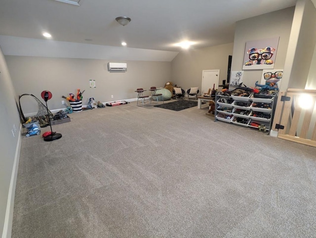  - recreation room featuring an AC wall unit and carpet
