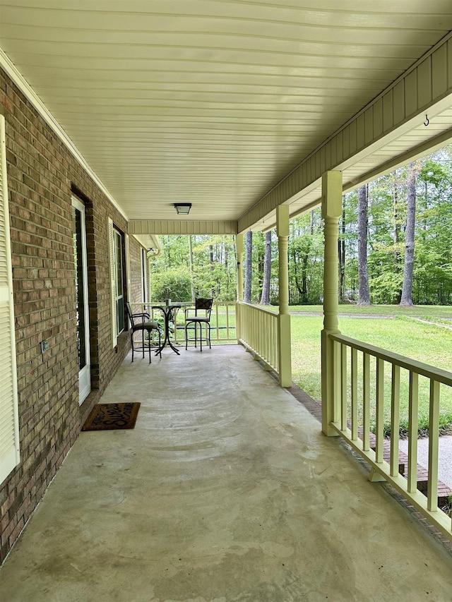 view of patio featuring a porch