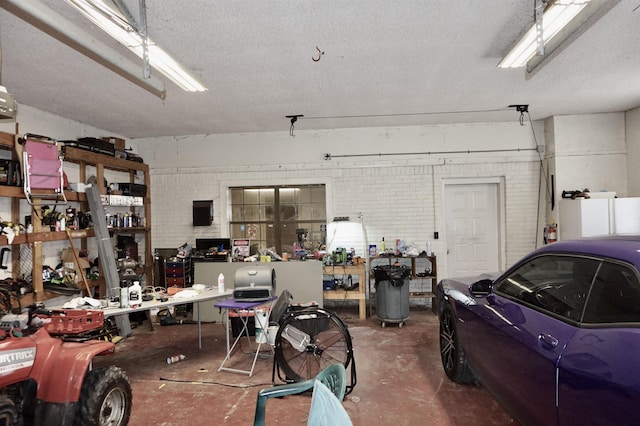 garage with a workshop area