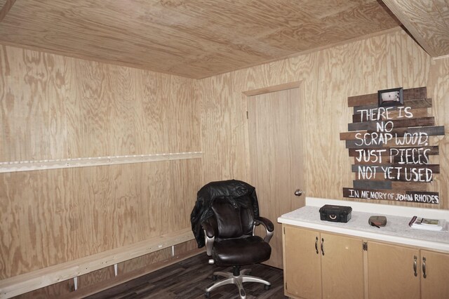 unfurnished office featuring wood walls and wooden ceiling