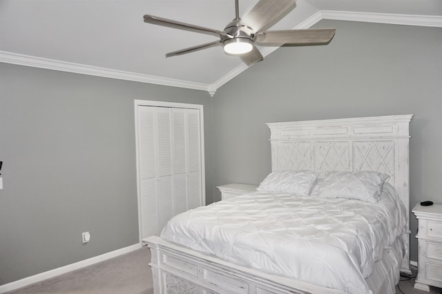 bedroom with ceiling fan, vaulted ceiling, light carpet, a closet, and ornamental molding