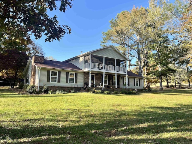  - view of front of property featuring a front lawn