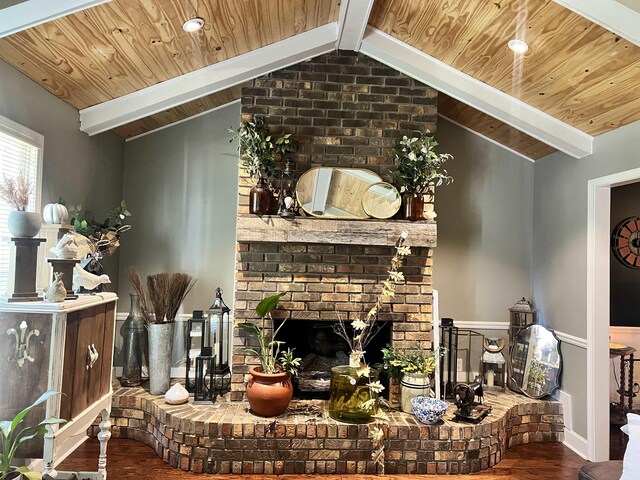  - living room with a fireplace, hardwood / wood-style floors, and lofted ceiling