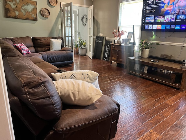  - living room with dark hardwood / wood-style flooring