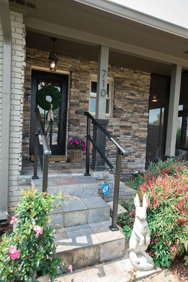  - fenced backyard featuring an outdoor fire pit and a patio area