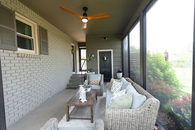  - sunroom featuring a ceiling fan, healthy amount of natural light, and an outdoor hangout area