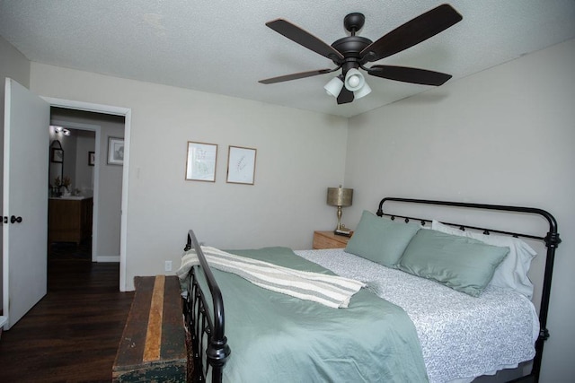 - bedroom featuring wood finished floors and a ceiling fan