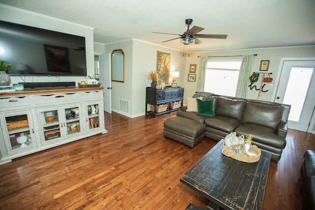  - living room featuring a ceiling fan, a textured ceiling, crown molding, and wood finished floors