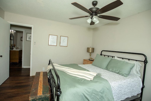  - bedroom with wood finished floors and ceiling fan