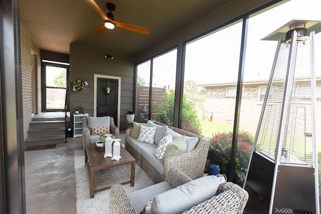  - sunroom with an outdoor living space, a ceiling fan, and healthy amount of natural light