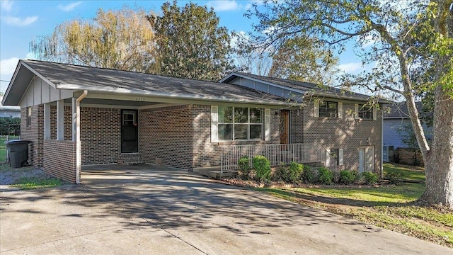 view of front facade with a carport