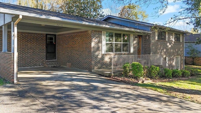 view of property exterior with a carport