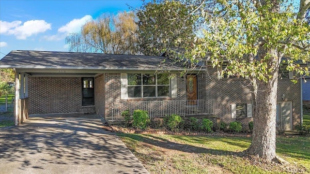 view of front of home with a carport