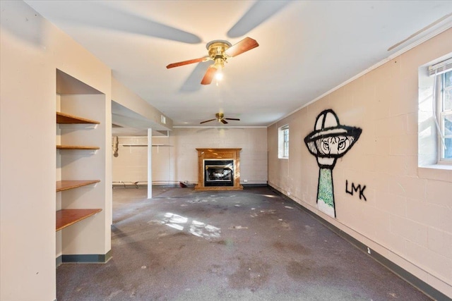 unfurnished living room with ornamental molding