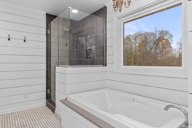 bathroom with separate shower and tub and wood walls