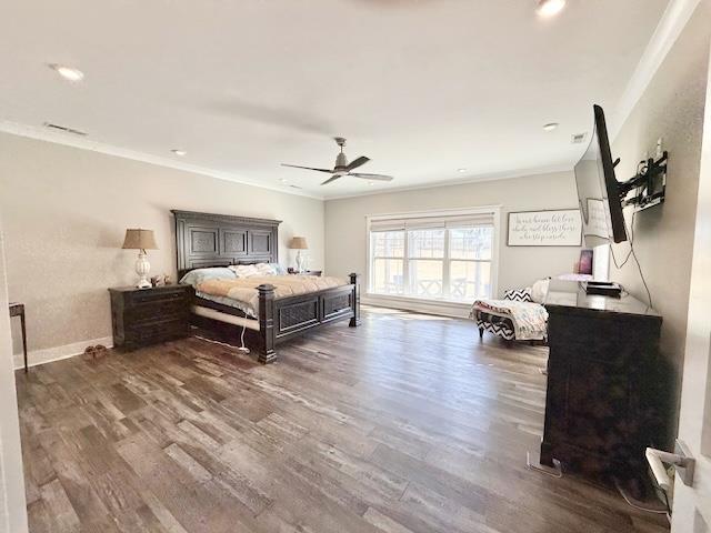  - bedroom with crown molding, wood finished floors, ceiling fan, baseboards, and recessed lighting