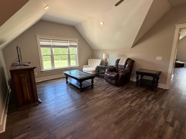  - living room with dark wood finished floors, vaulted ceiling, baseboards, and ceiling fan