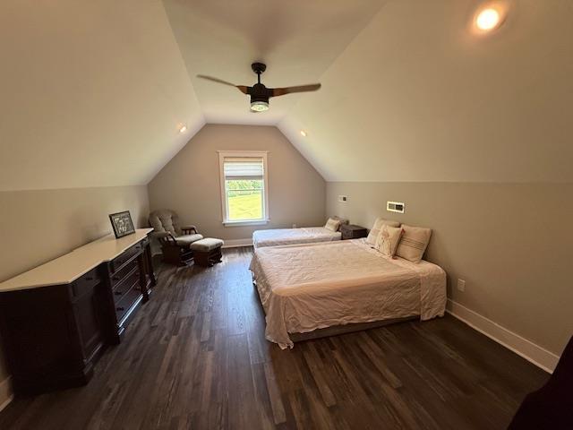  - bedroom featuring ceiling fan, dark wood-style flooring, vaulted ceiling, and baseboards