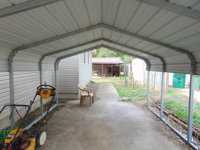 garage featuring a carport