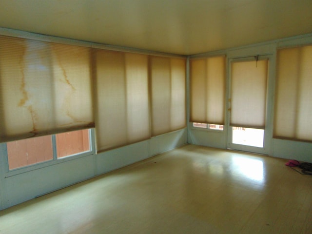 unfurnished room with light hardwood / wood-style flooring