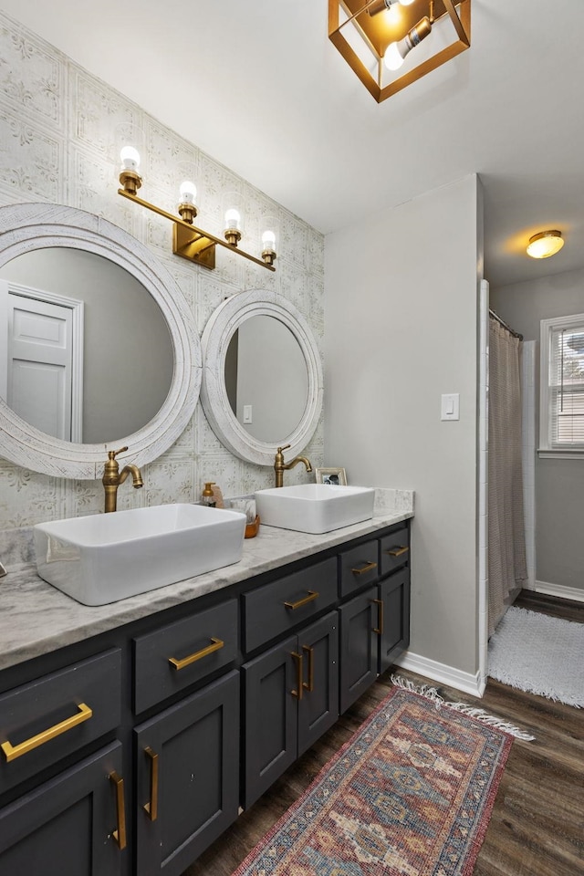 bathroom featuring vanity and hardwood / wood-style floors