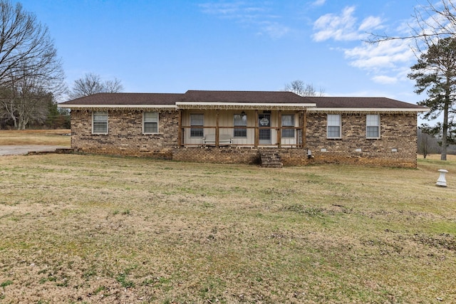 single story home featuring a porch and a front lawn