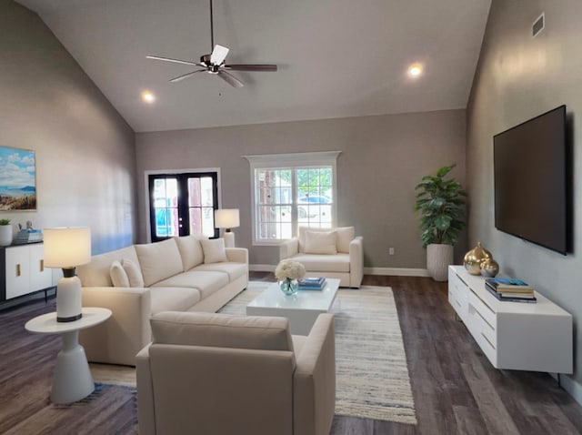 living room featuring ceiling fan, dark hardwood / wood-style floors, and high vaulted ceiling