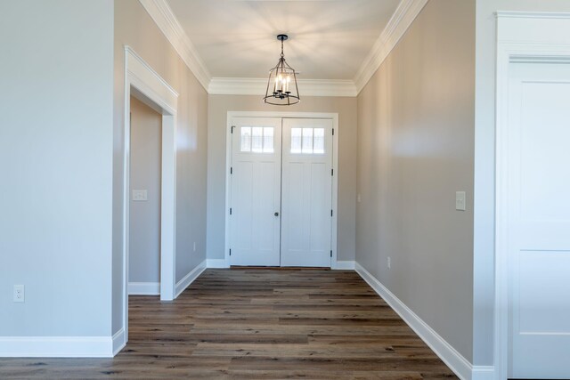 kitchen featuring light stone counters, sink, crown molding, and a center island with sink