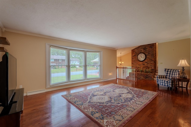  - living room with a baseboard radiator, wood finished floors, ornamental molding, a chandelier, and baseboards