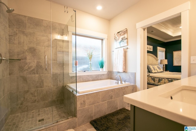  - full bathroom with ensuite bath, a stall shower, a bath, vanity, and crown molding