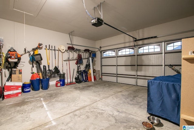  - garage featuring a garage door opener