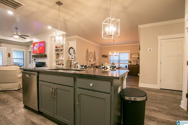  - kitchen with stainless steel dishwasher, a chandelier, dark wood finished floors, crown molding, and open floor plan