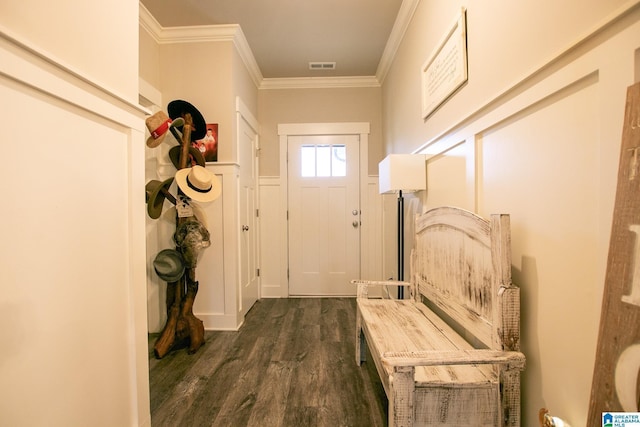  - entrance foyer with ornamental molding and dark wood-style flooring