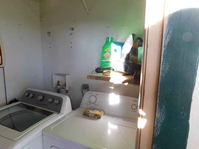 clothes washing area with laundry area and independent washer and dryer