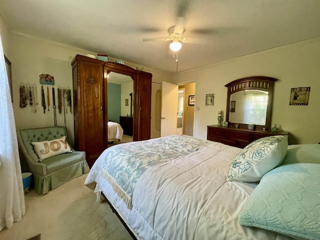  - carpeted bedroom featuring ceiling fan and ornamental molding