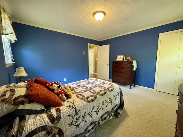  - carpeted bedroom with a textured ceiling, ornamental molding, and baseboards