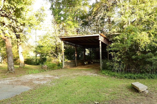 view of yard featuring a carport