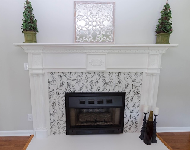 details featuring hardwood / wood-style flooring