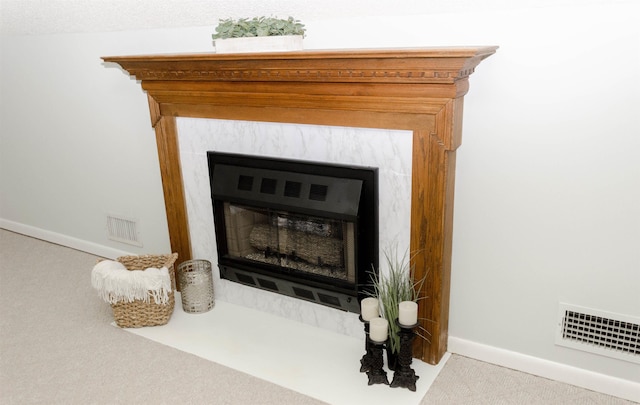 details with a fireplace and carpet flooring