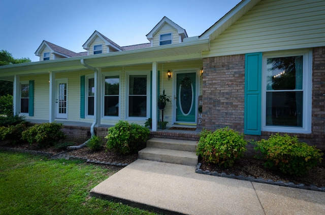 entrance to property with covered porch