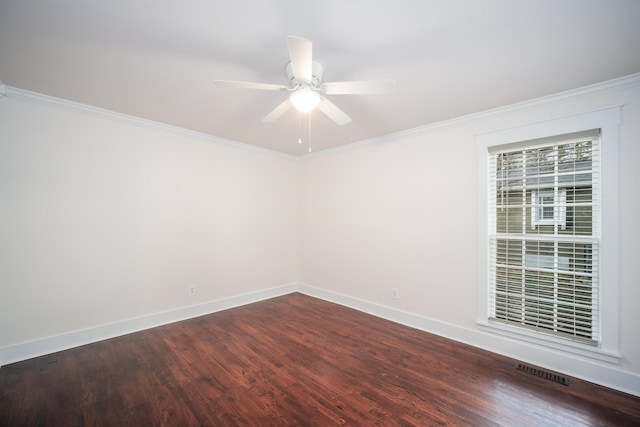 unfurnished room featuring ceiling fan, wood-type flooring, and crown molding