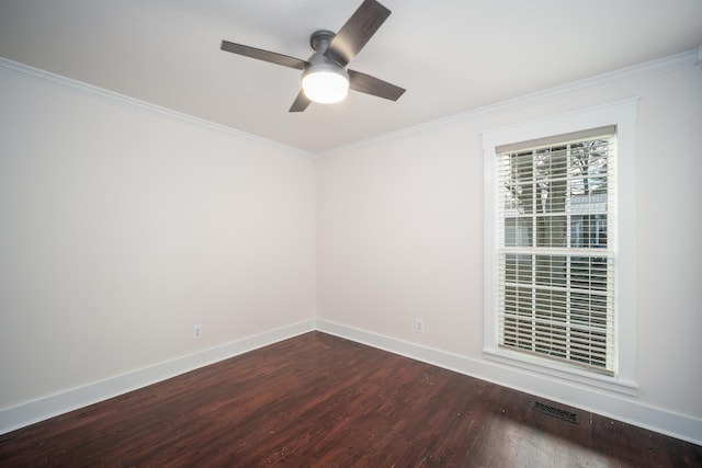 empty room with hardwood / wood-style flooring, ceiling fan, and ornamental molding