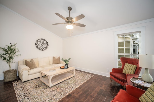 living room featuring ceiling fan, dark hardwood / wood-style floors, and ornamental molding