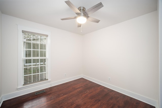 empty room featuring ceiling fan and wood-type flooring