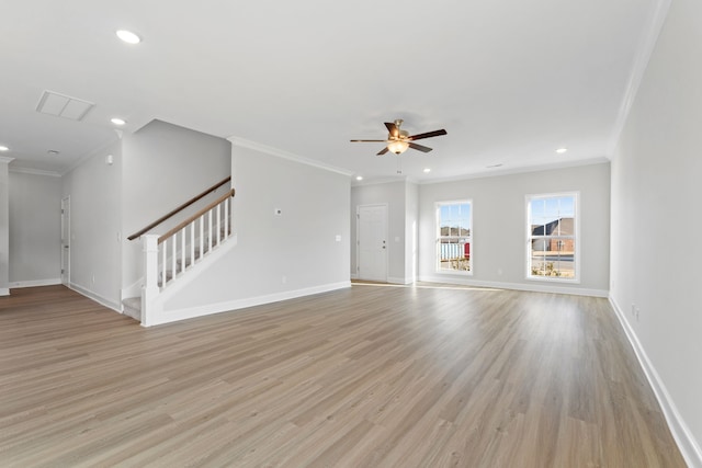 unfurnished living room with light wood-type flooring, recessed lighting, baseboards, and stairs