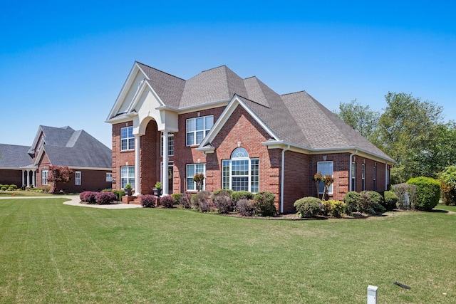 front facade with a front yard